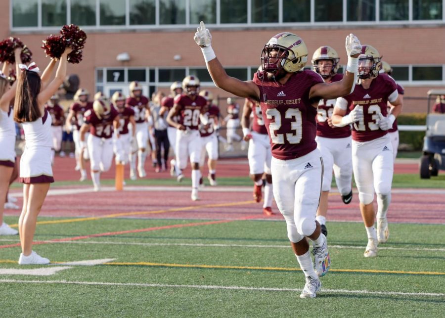 Jeramiah Jackson '22 Leads the Braves onto the field